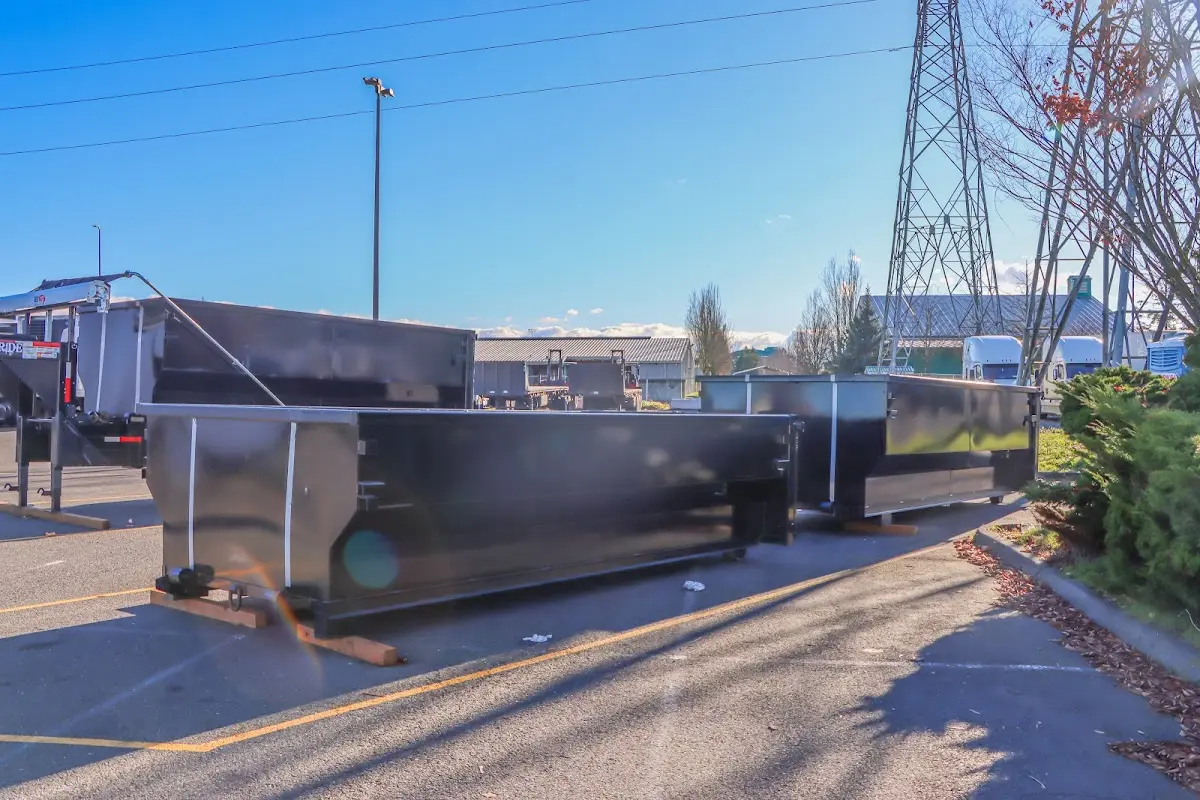 Roll-off dumpster ready for waste disposal at job site for 2 Yard Dumpster Rental in Vinton